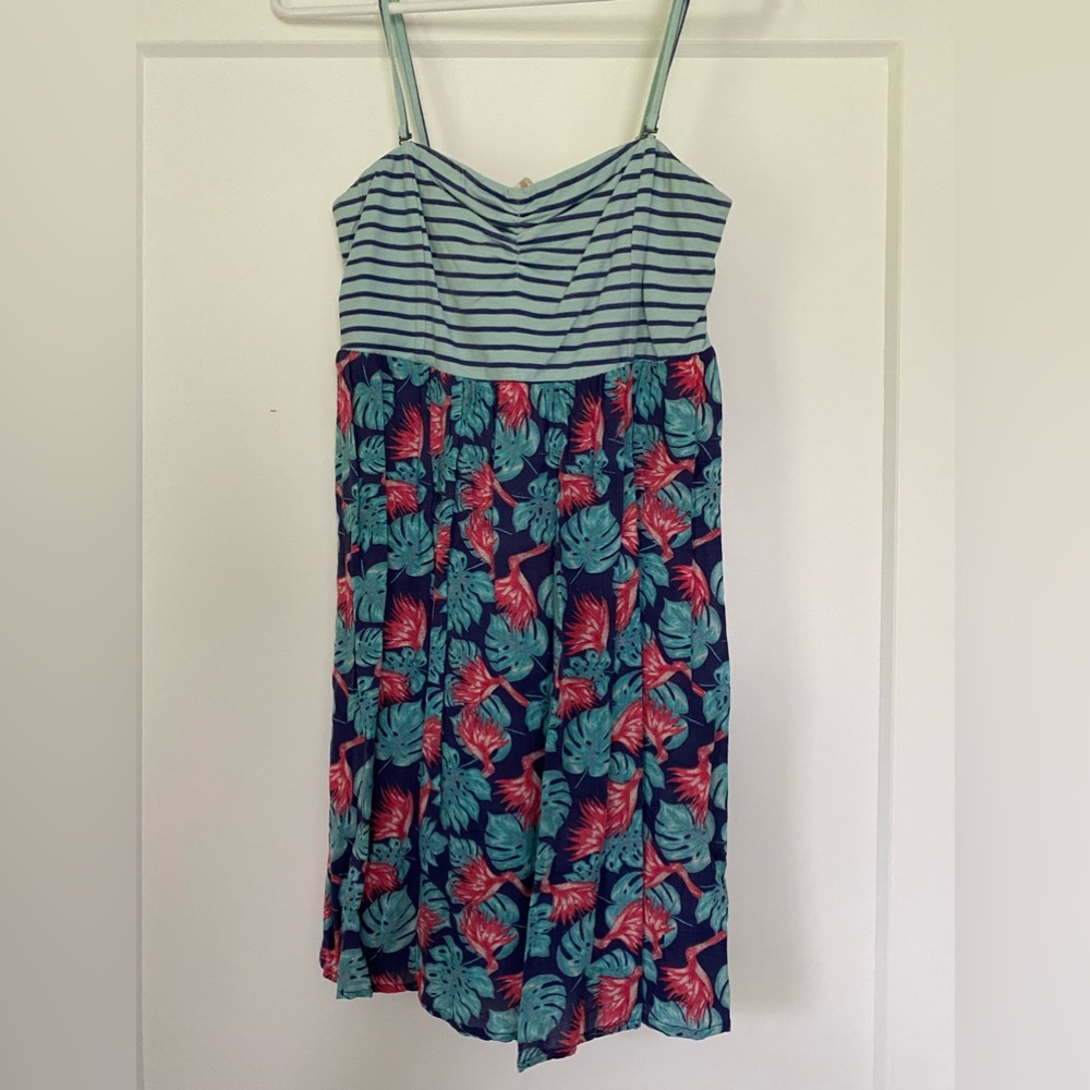 Roxy Dress 
Has adjustable straps, and grip around bust to hold in place